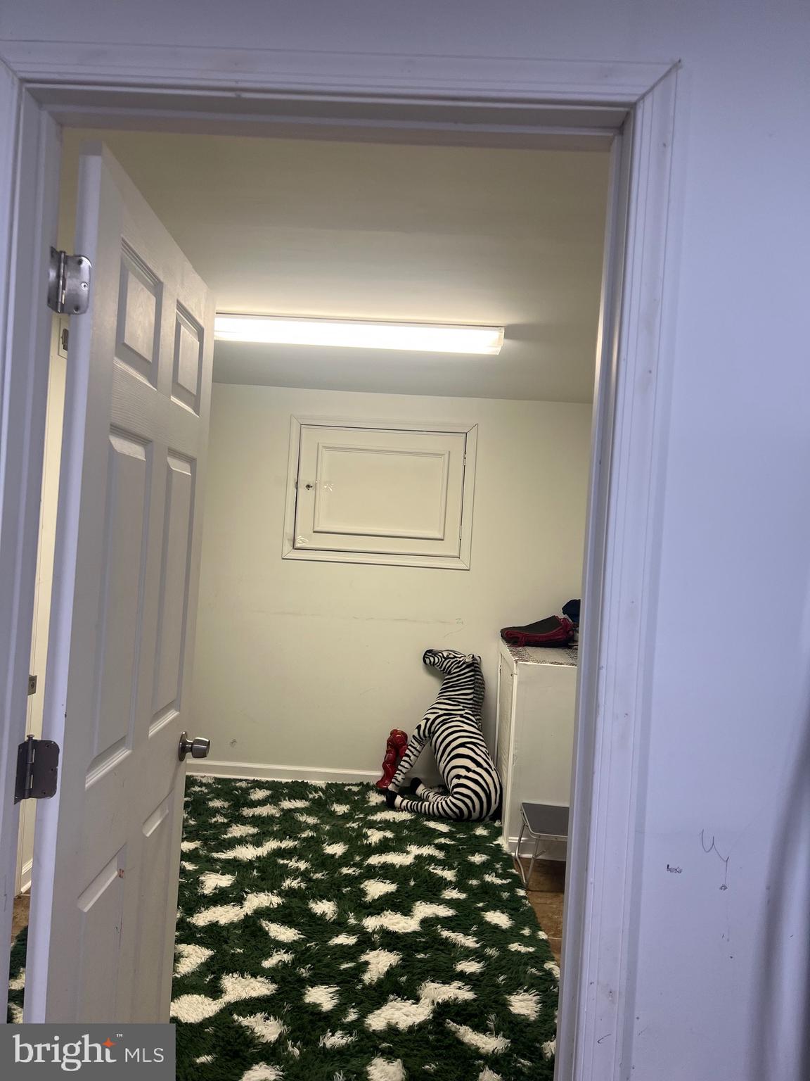 15704 Beau Ridge Drive Woodbridge, VA 22193 - Photo 13 of 26 a bedroom with a bed and a window