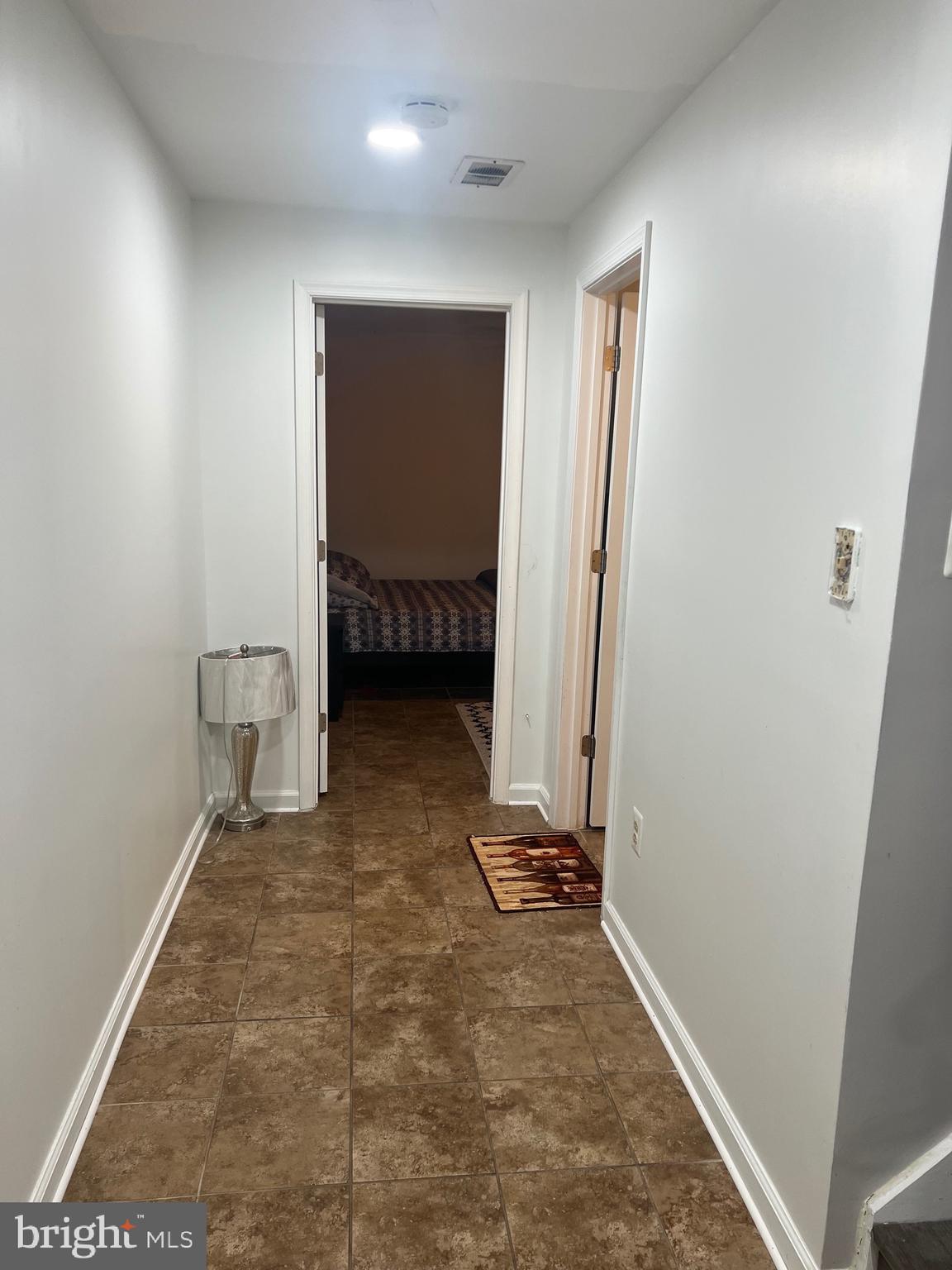 15704 Beau Ridge Drive Woodbridge, VA 22193 - Photo 18 of 26 a view of room with a window and gym equipment