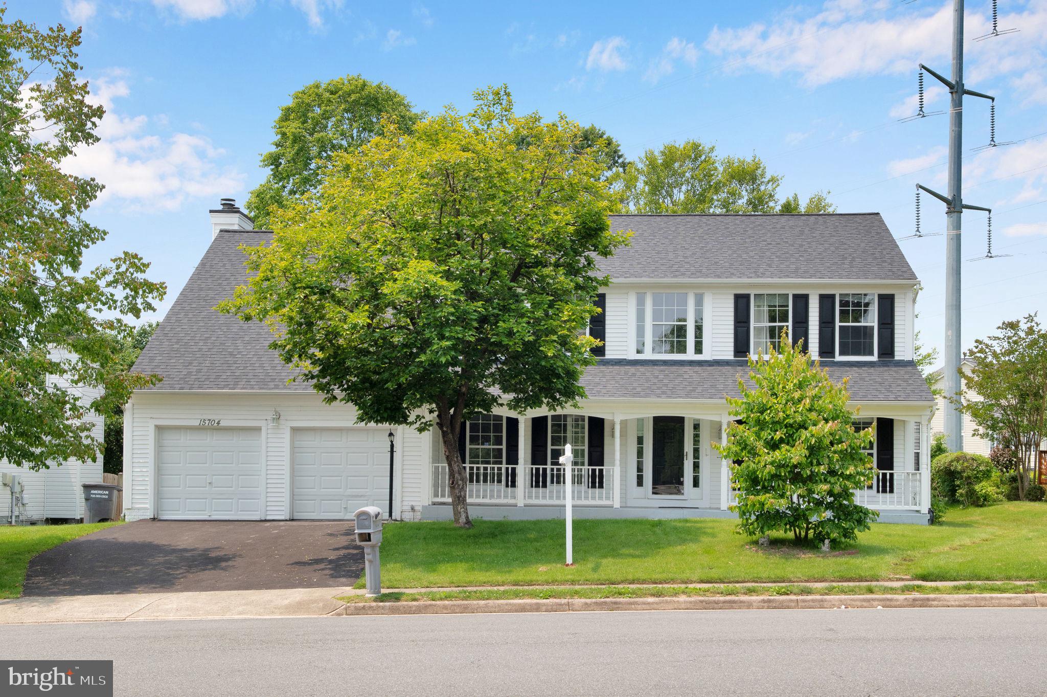 15704 Beau Ridge Drive Woodbridge, VA 22193 - Photo 2 of 26 a front view of a house with garden