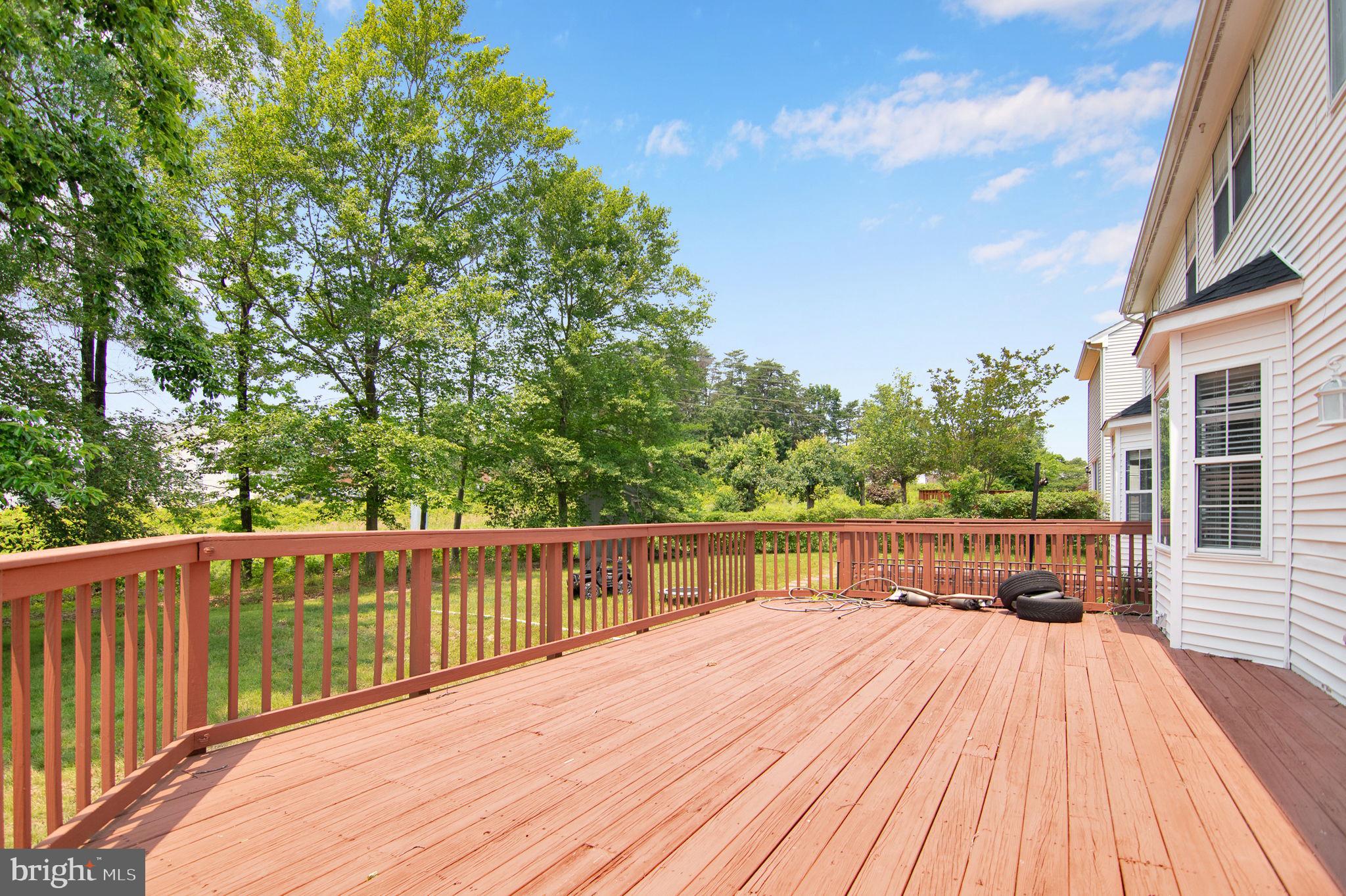 15704 Beau Ridge Drive Woodbridge, VA 22193 - Photo 7 of 26 a view of balcony with wooden floor and fence