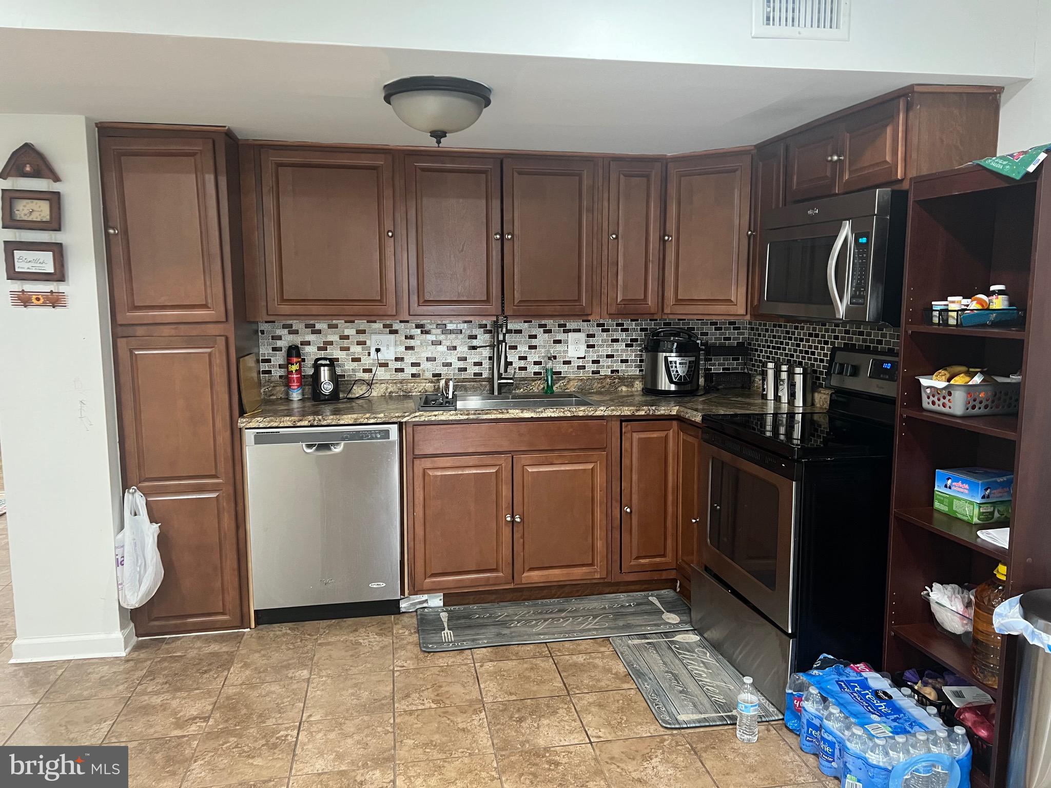 15704 Beau Ridge Drive Woodbridge, VA 22193 - Photo 10 of 26 a kitchen with a sink and cabinets