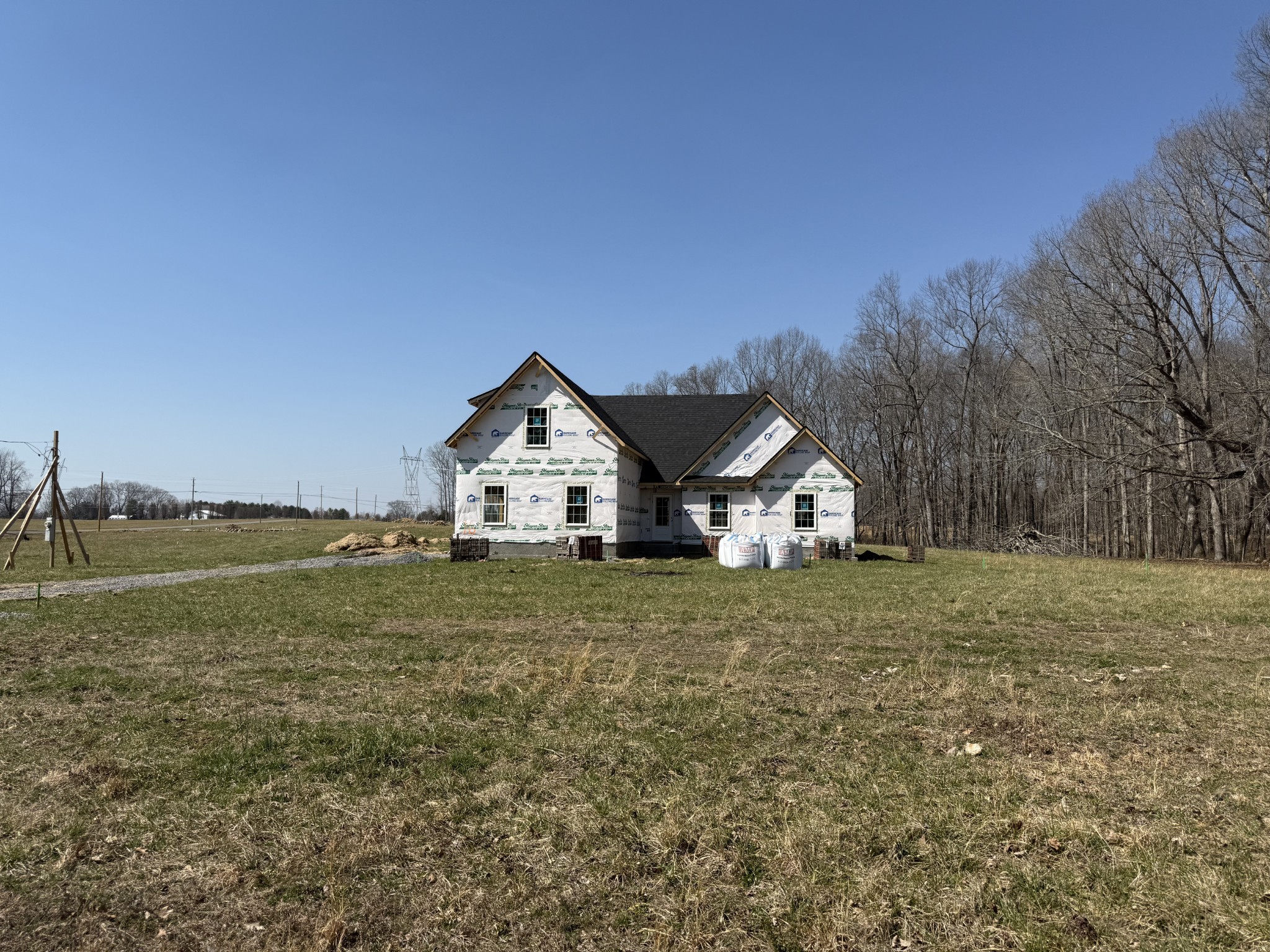 0 Dorsch Road Manchester, TN 37355 - Photo 2 of 14 a front view of a house with a yard and trees