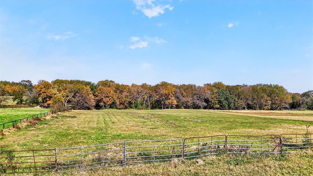 1937 Spring Hill Road Aubrey, TX 76227 - Photo 18 of 30 a view of an ocean and a mountain