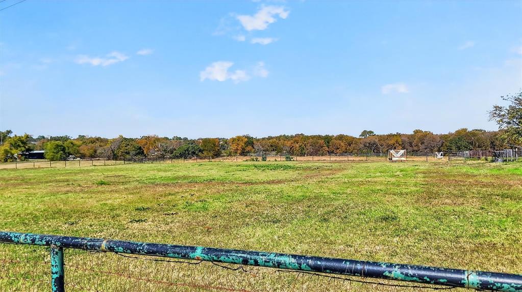 1937 Spring Hill Road Aubrey, TX 76227 - Photo 21 of 30 a view of an ocean and beach