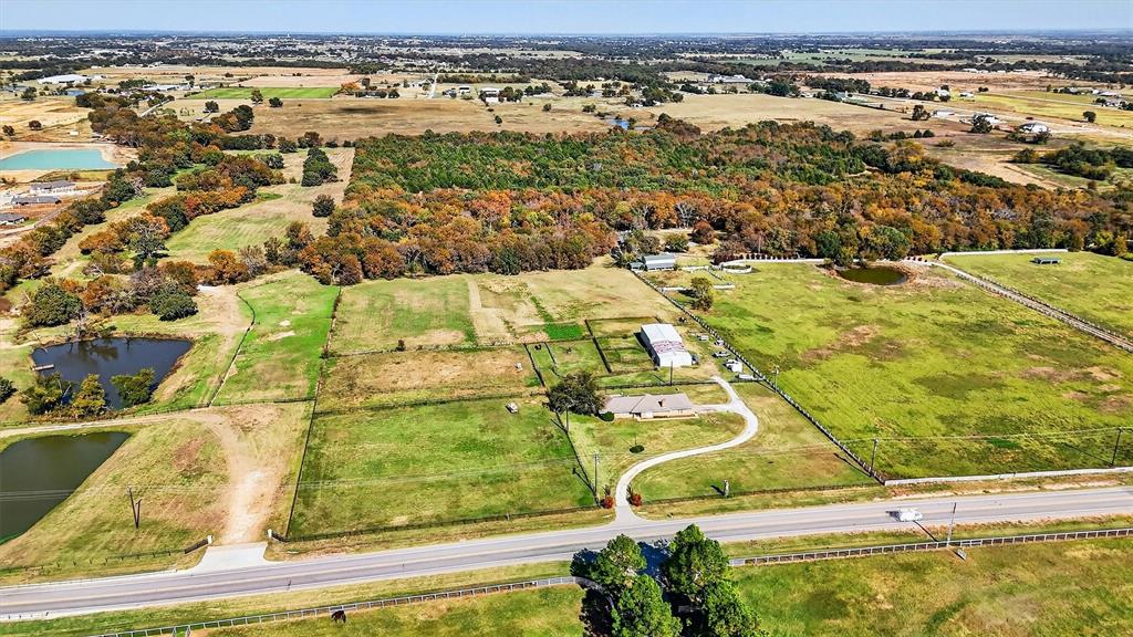 1937 Spring Hill Road Aubrey, TX 76227 - Photo 4 of 30 an aerial view of residential houses with outdoor space