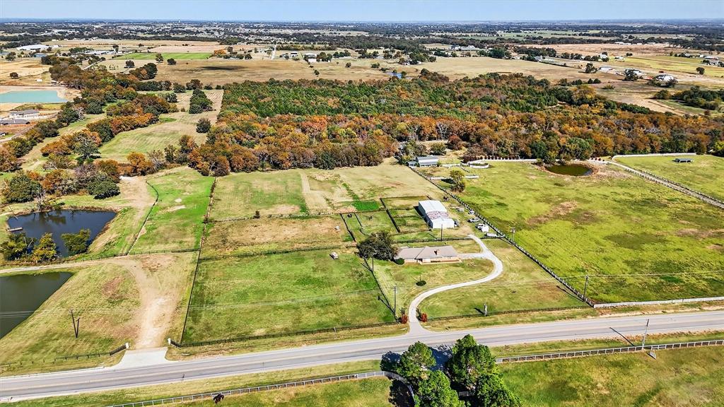 1937 Spring Hill Road Aubrey, TX 76227 - Photo 6 of 30 an aerial view of residential houses with outdoor space