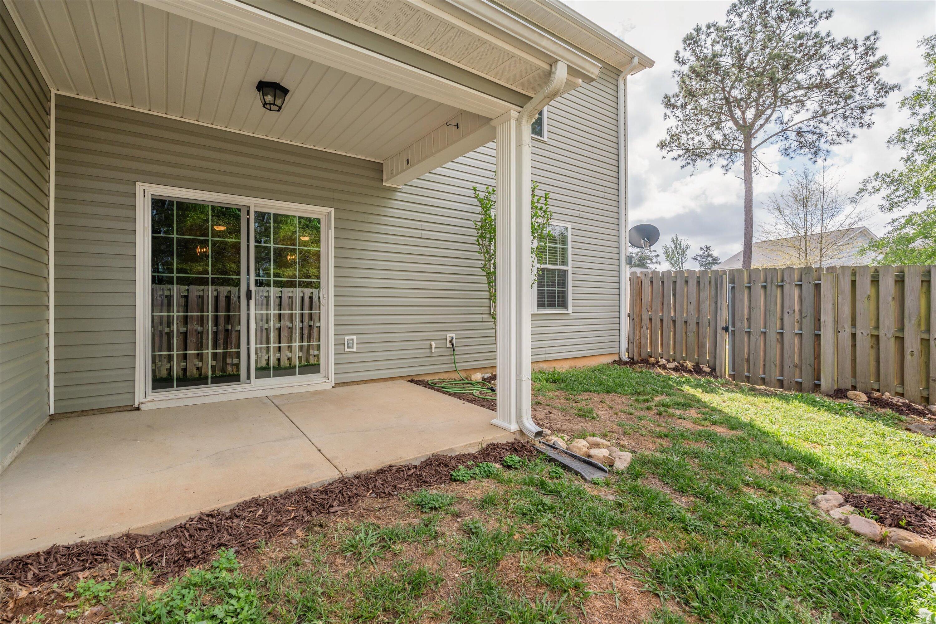 659 Aberdeen Circle Grovetown, GA 30813 - Photo 31 of 36 Backyard with patio & gated entry