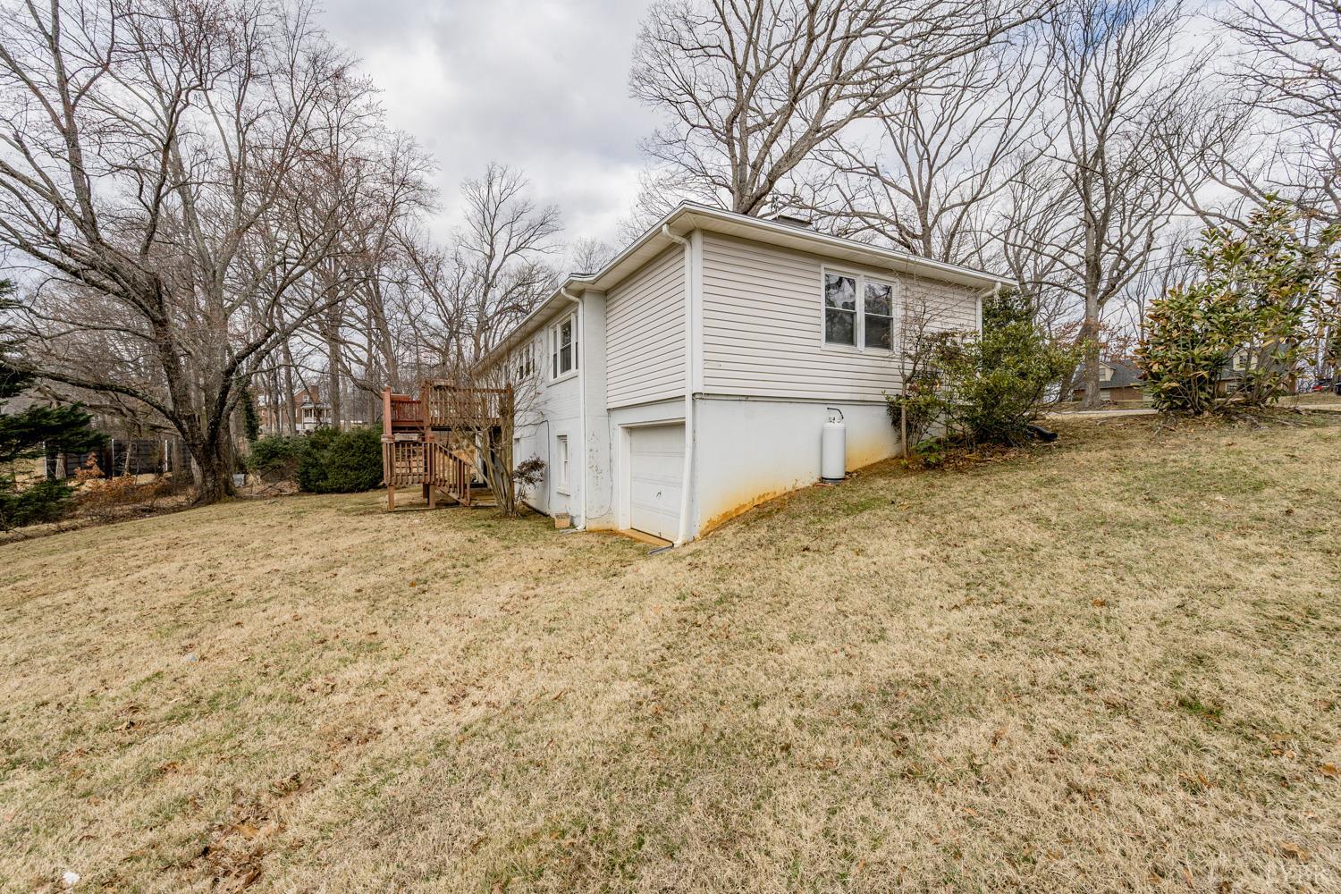 4925 Old Boonsboro Road Lynchburg, VA 24503 - Photo 54 of 57 a view of a house with a yard covered in snow