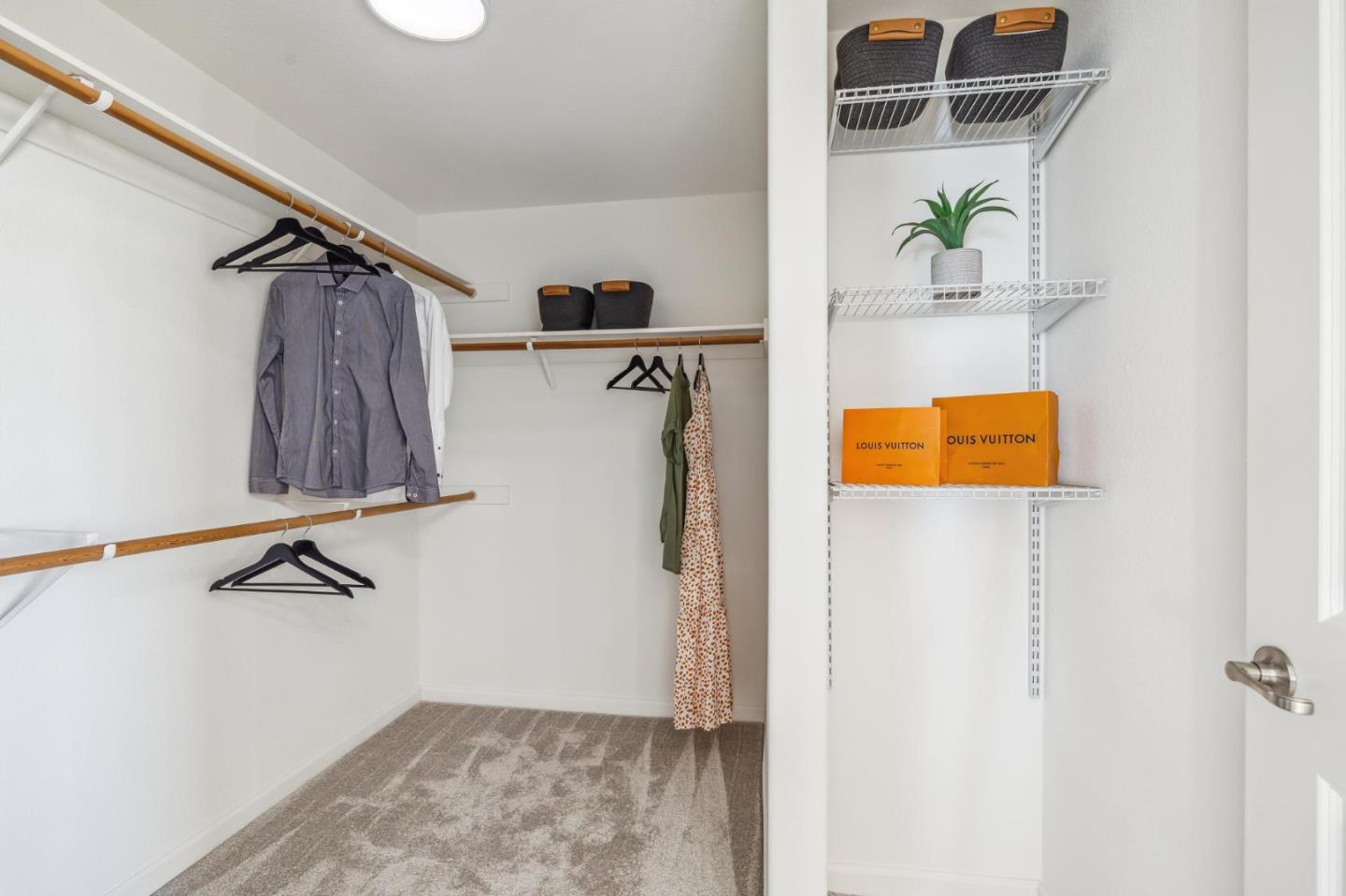 1388 Broadway, Unit 209 Millbrae, CA 94030 - Photo 24 of 40 a view of walk in closet with clothes and shoes