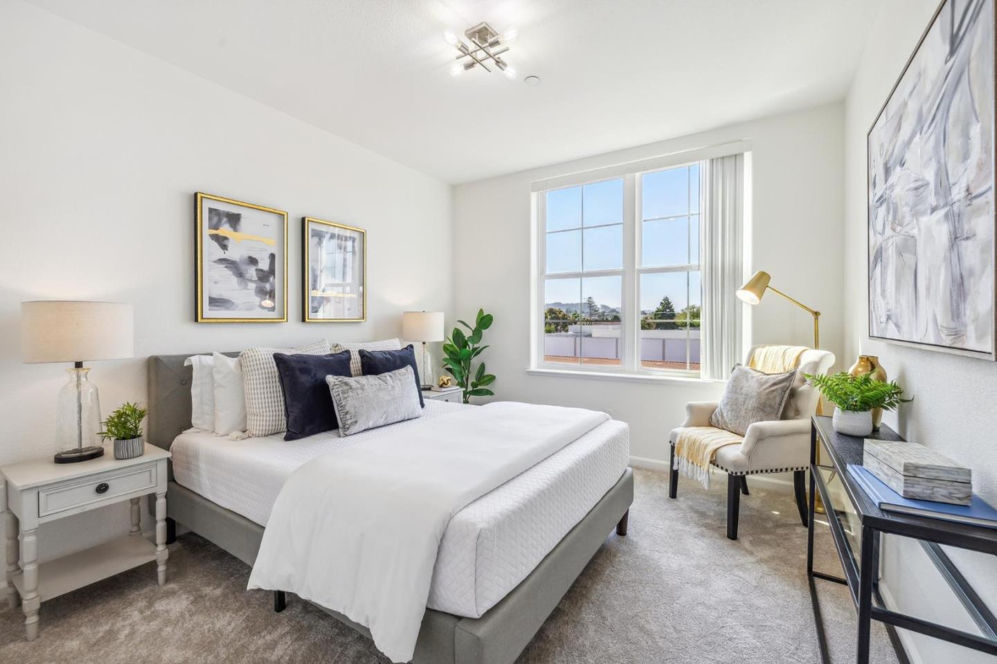 1388 Broadway, Unit 209 Millbrae, CA 94030 - Photo 25 of 40 a bedroom with a large bed and a window