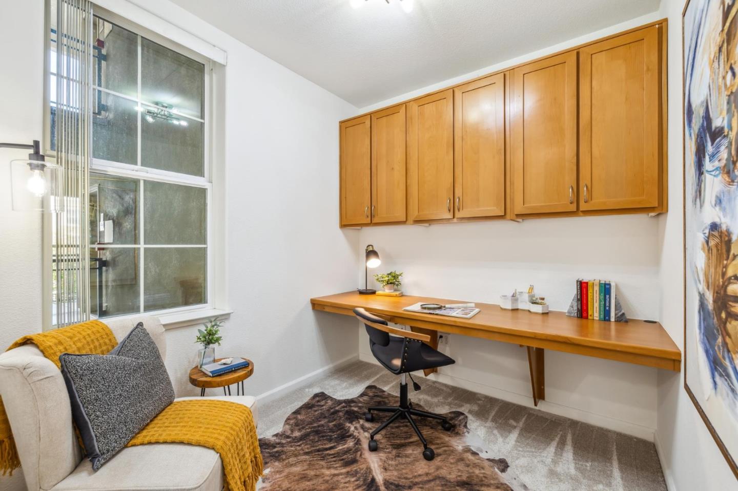 1388 Broadway, Unit 209 Millbrae, CA 94030 - Photo 31 of 40 a living room with furniture and a window