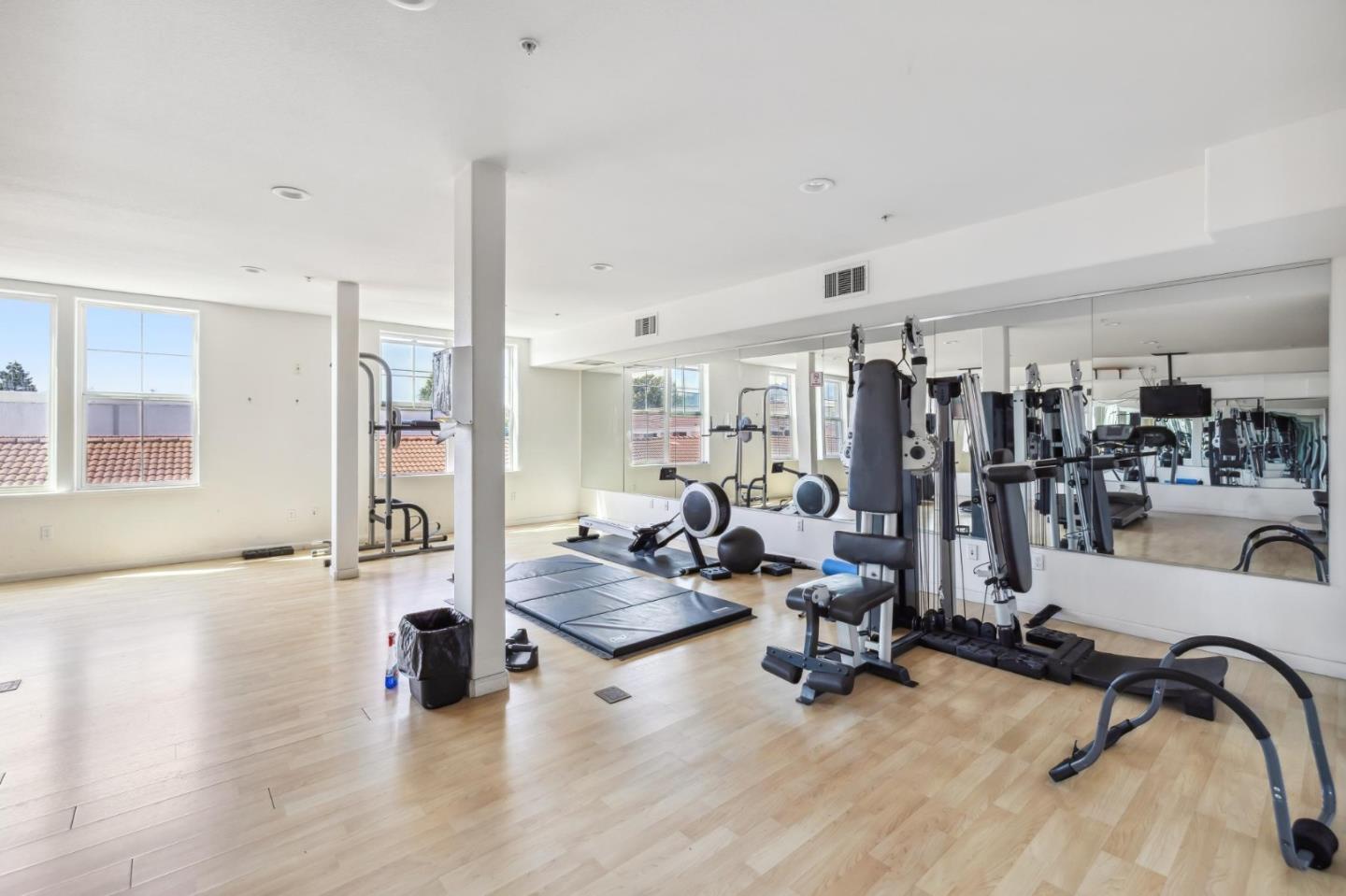 1388 Broadway, Unit 209 Millbrae, CA 94030 - Photo 34 of 40 a view of a room with gym equipment
