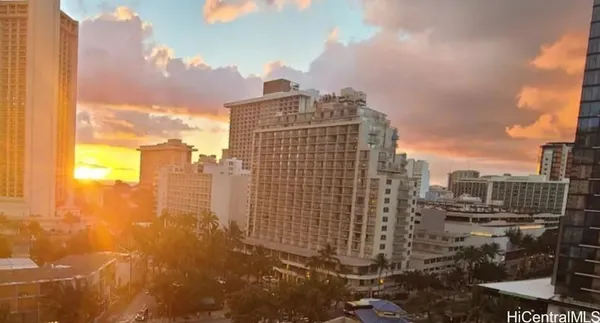 a view of a city with tall buildings
