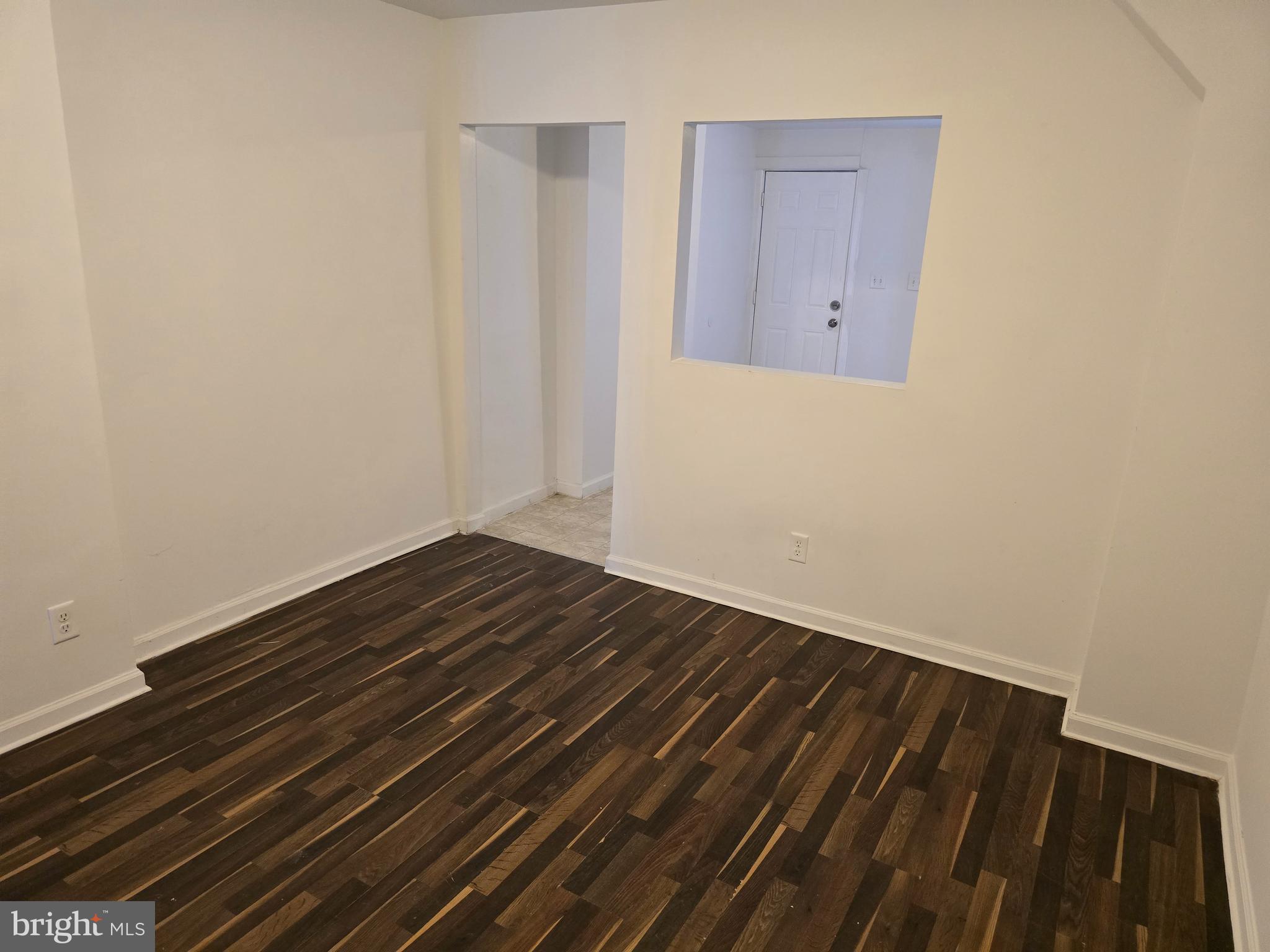 2418 Etting Street Baltimore, MD 21217 - Photo 11 of 24 a view of room with wooden floor