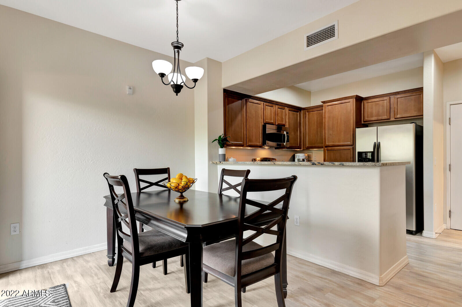 3935 East Rough Rider Road, Unit 1037 Phoenix, AZ 85050 - Photo 8 of 52 Dining Room and Kitchen