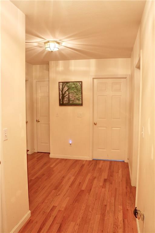 40 Hanscomb School Road Limington, ME 04049 - Photo 13 of 22 Hallway leading to three bedrooms...