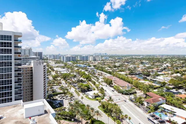 a view of a city with tall buildings