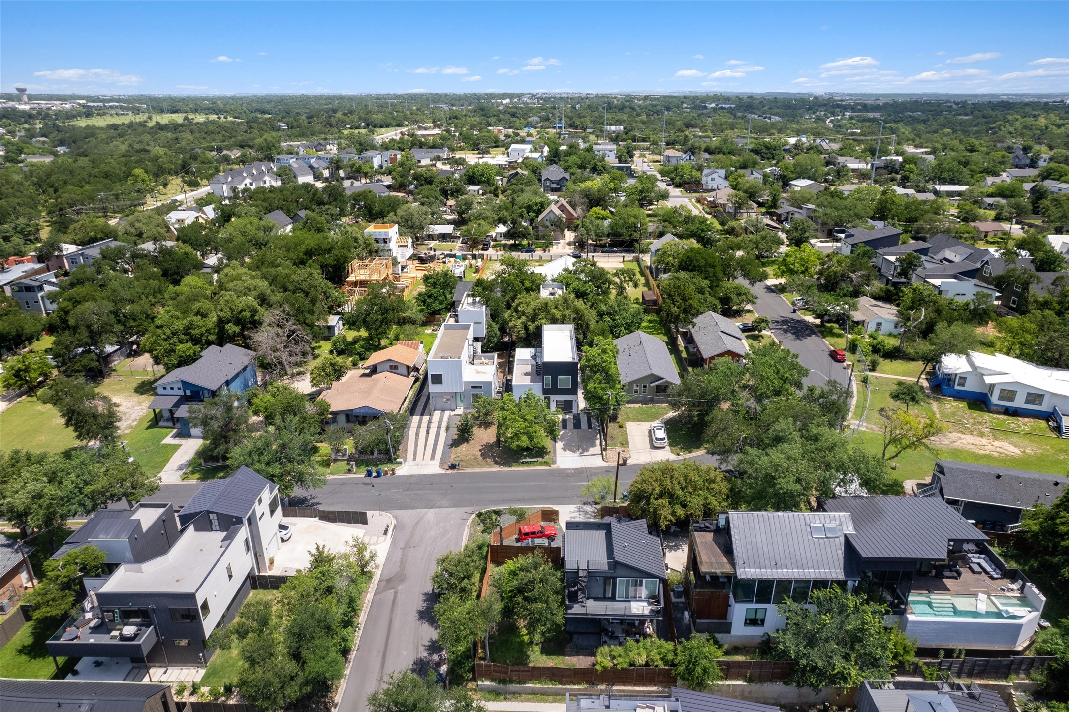 4712 Reyes Street, Unit 1 Austin, TX 78721 - Photo 37 of 38 an aerial view of residential houses with outdoor space and trees