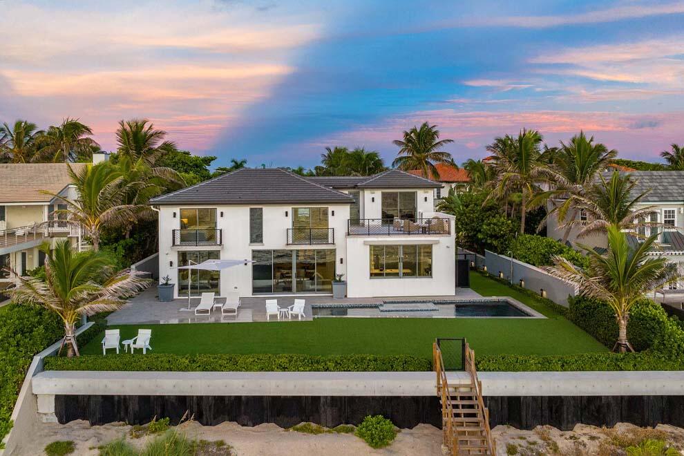 6029 Old Ocean Boulevard Ocean Ridge, FL 33435 - Photo 12 of 13 aerial view of a house with balcony and garden