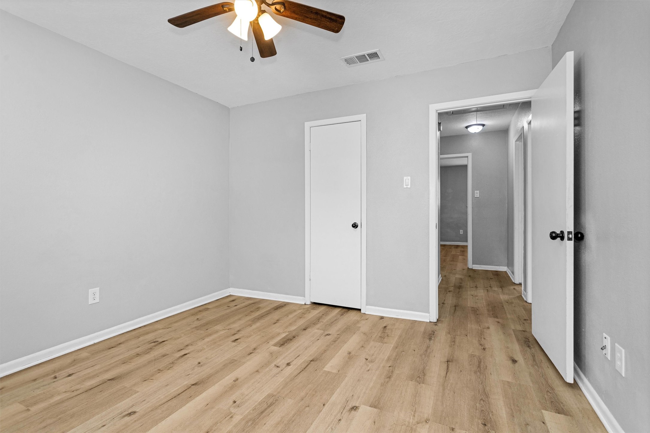 4655 Old Anderson Lane Conroe, TX 77304 - Photo 16 of 23 wooden floor in an empty room with a window
