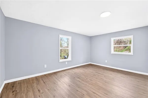 an empty room with a window