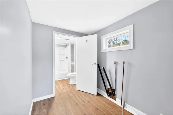 a view of entryway with wooden floor