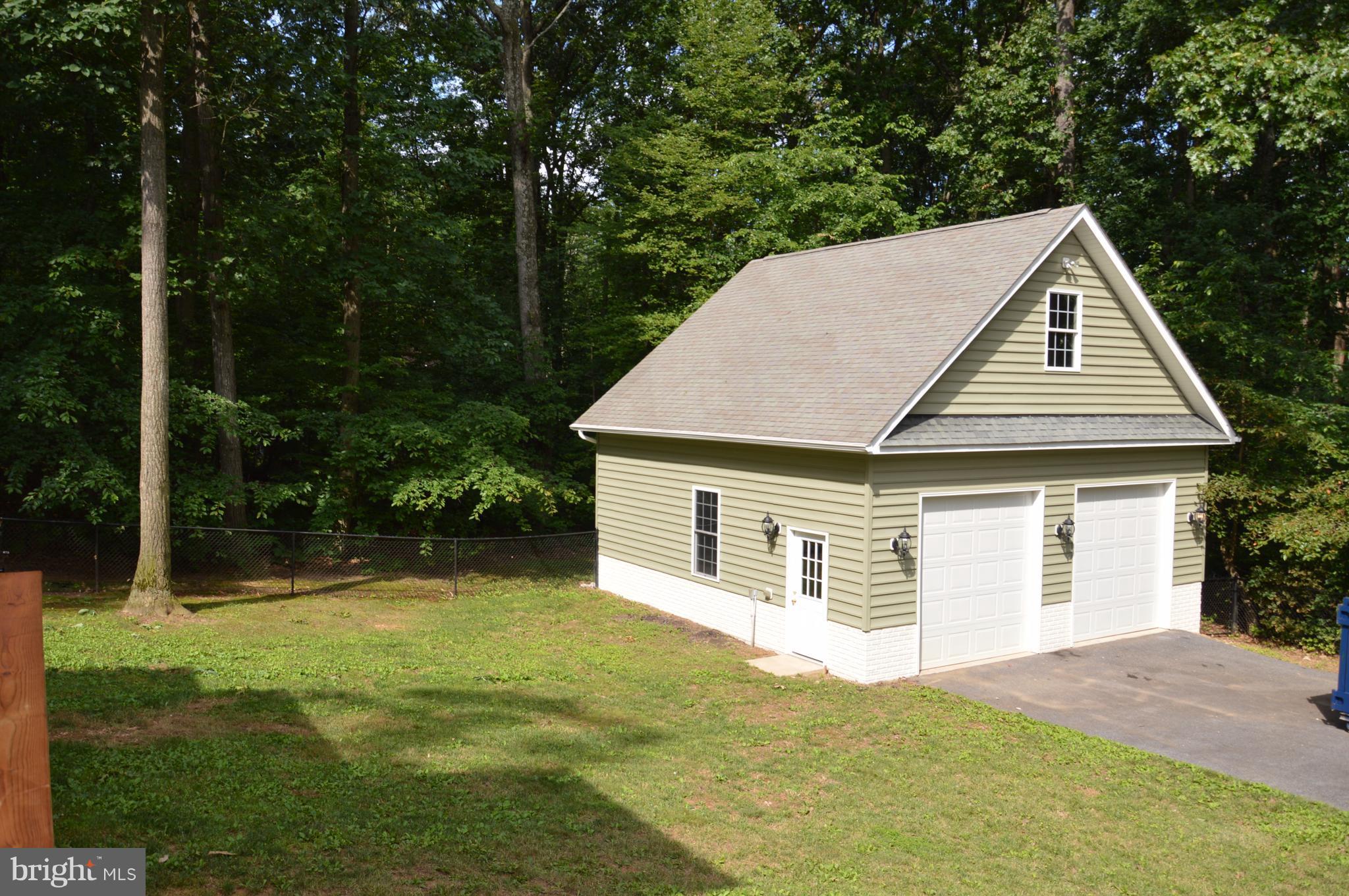 7536 Talbot Run Road Mount Airy, MD 21771 - Photo 17 of 22 a view of a house with backyard and garden