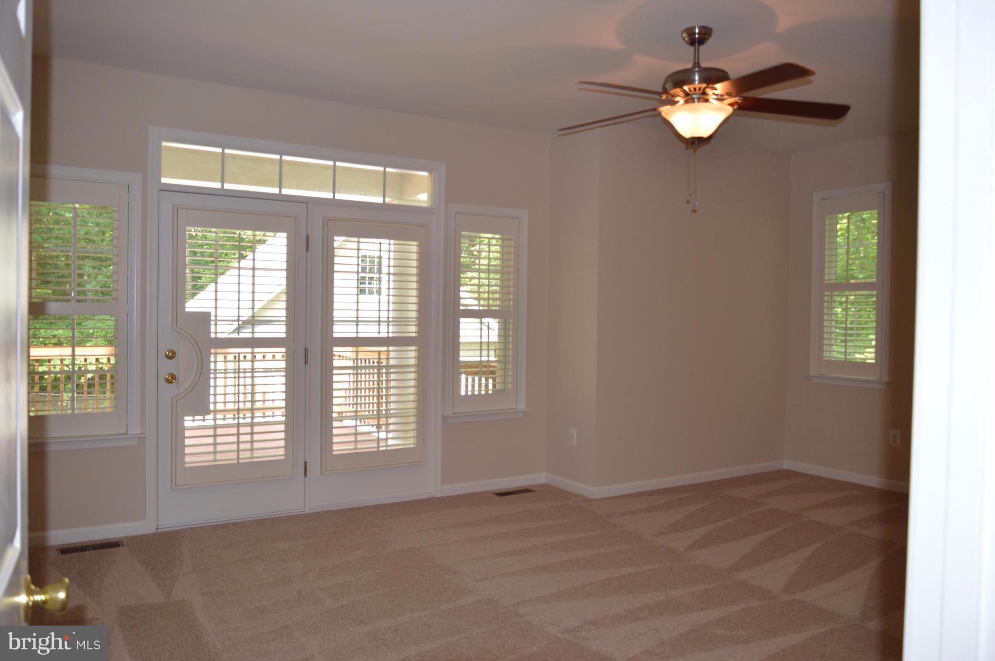 7536 Talbot Run Road Mount Airy, MD 21771 - Photo 18 of 22 a view of an empty room with a window