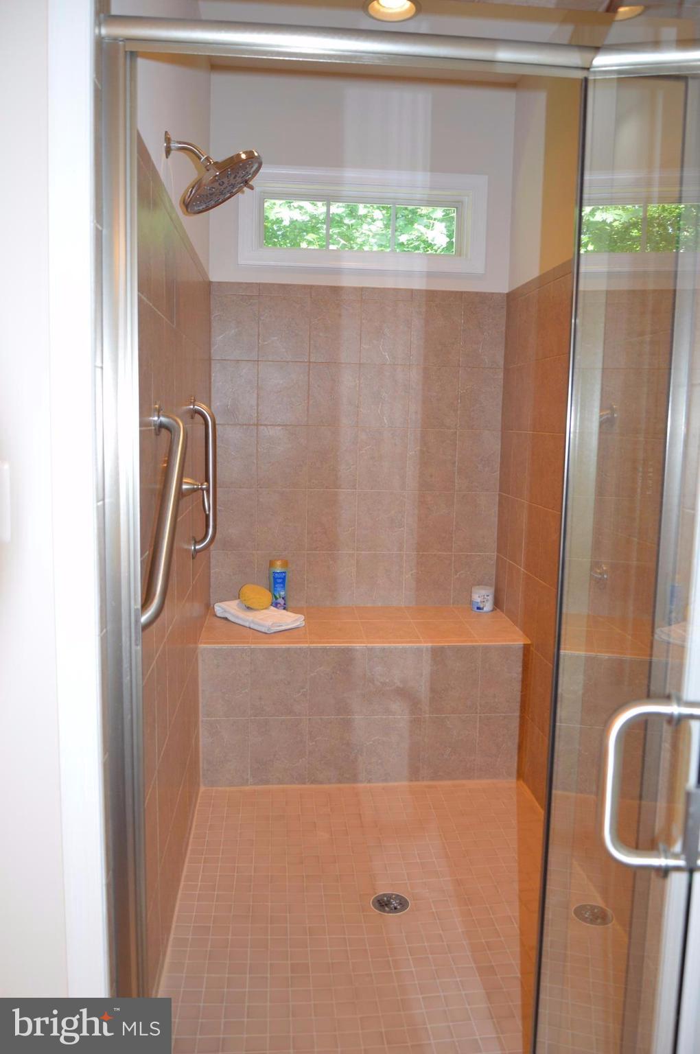 7536 Talbot Run Road Mount Airy, MD 21771 - Photo 19 of 22 a bathroom with a bathtub