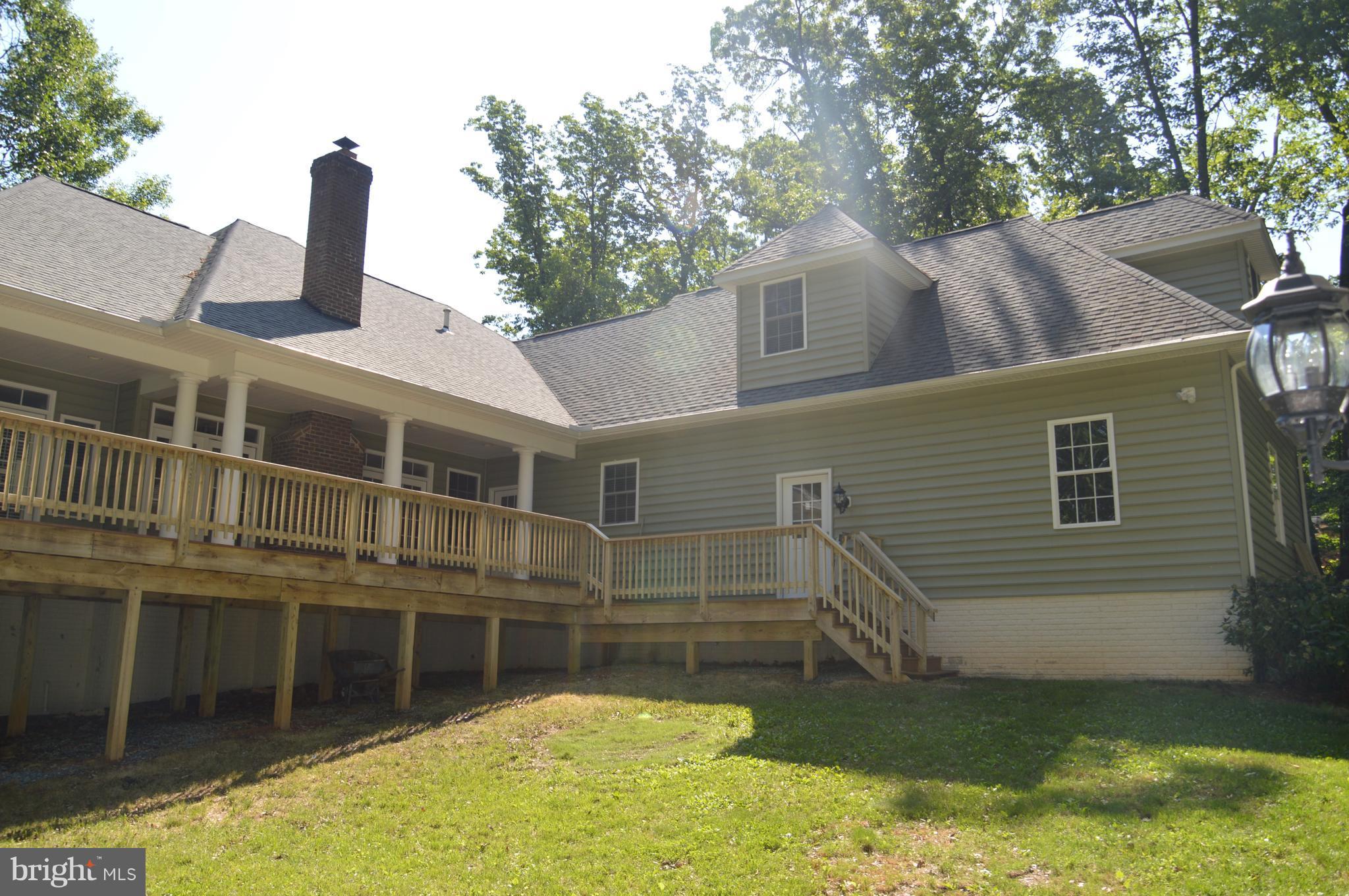 7536 Talbot Run Road Mount Airy, MD 21771 - Photo 5 of 22 a front view of a house with a yard