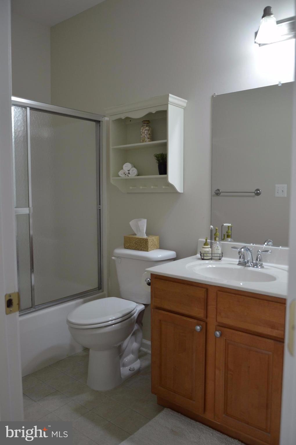 7536 Talbot Run Road Mount Airy, MD 21771 - Photo 9 of 22 a bathroom with a sink toilet and shower
