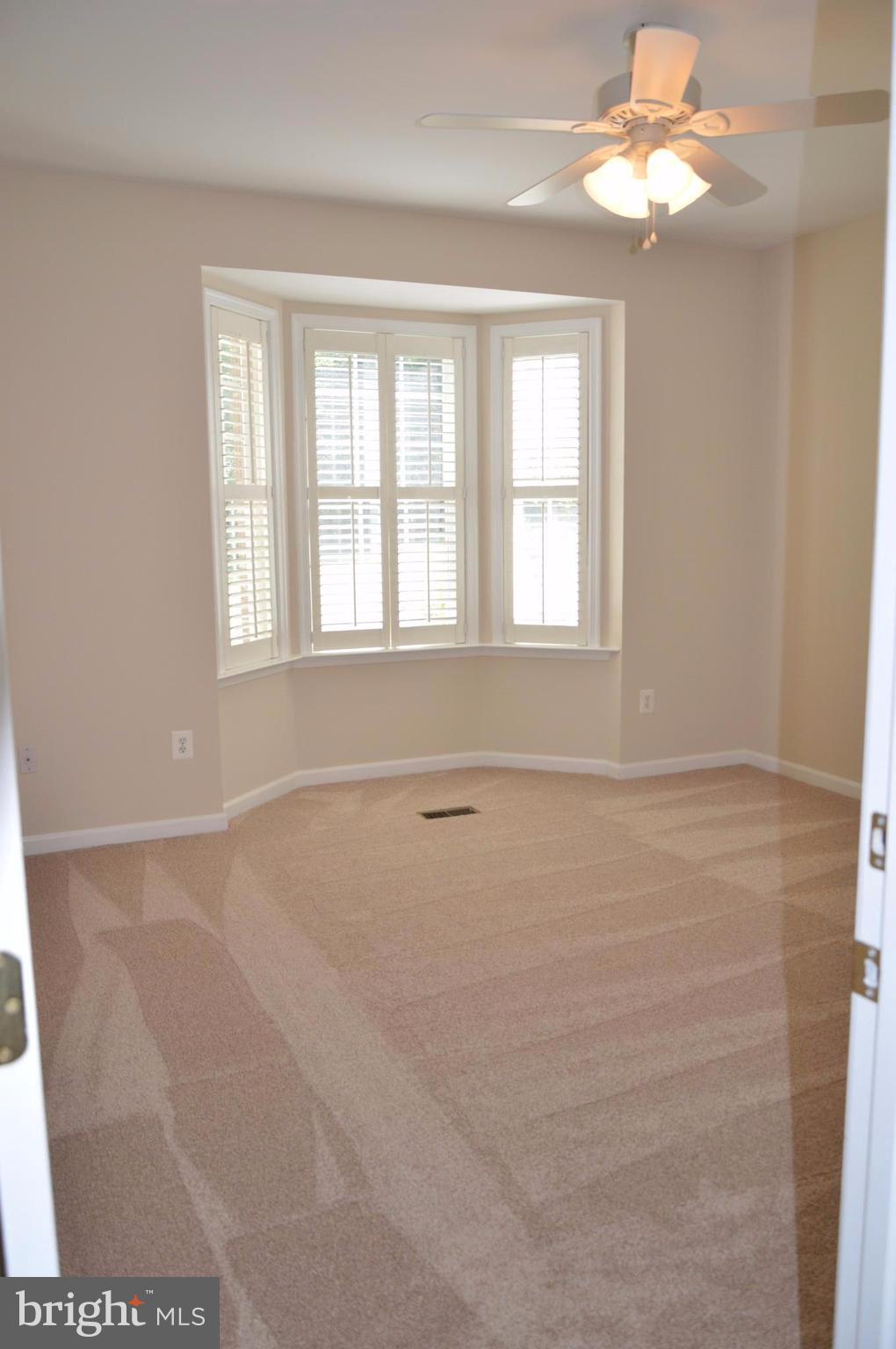 7536 Talbot Run Road Mount Airy, MD 21771 - Photo 10 of 22 a view of an empty room with a window