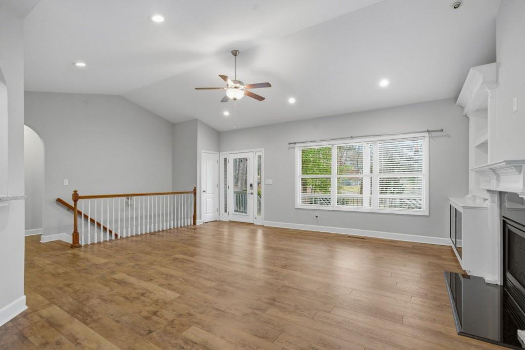 42 Nate Trail Dallas, GA 30157 - Photo 12 of 67 a view of an empty room with a window and fireplace