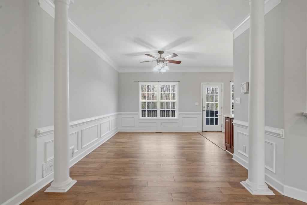 42 Nate Trail Dallas, GA 30157 - Photo 13 of 67 a view of an empty room with a window and wooden floor