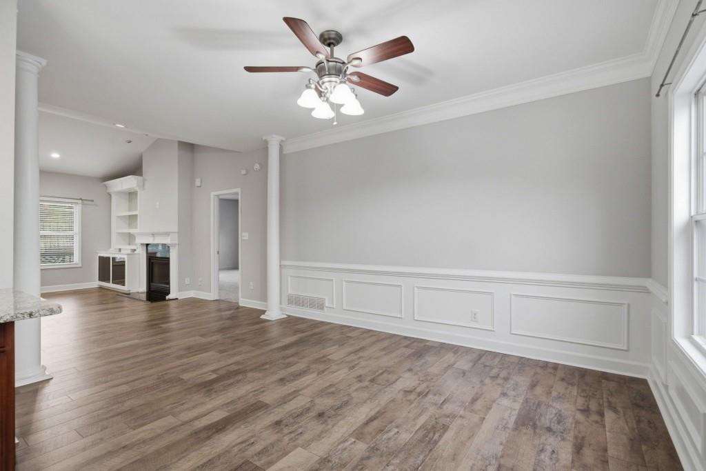 42 Nate Trail Dallas, GA 30157 - Photo 15 of 67 wooden floor in an empty room with a window
