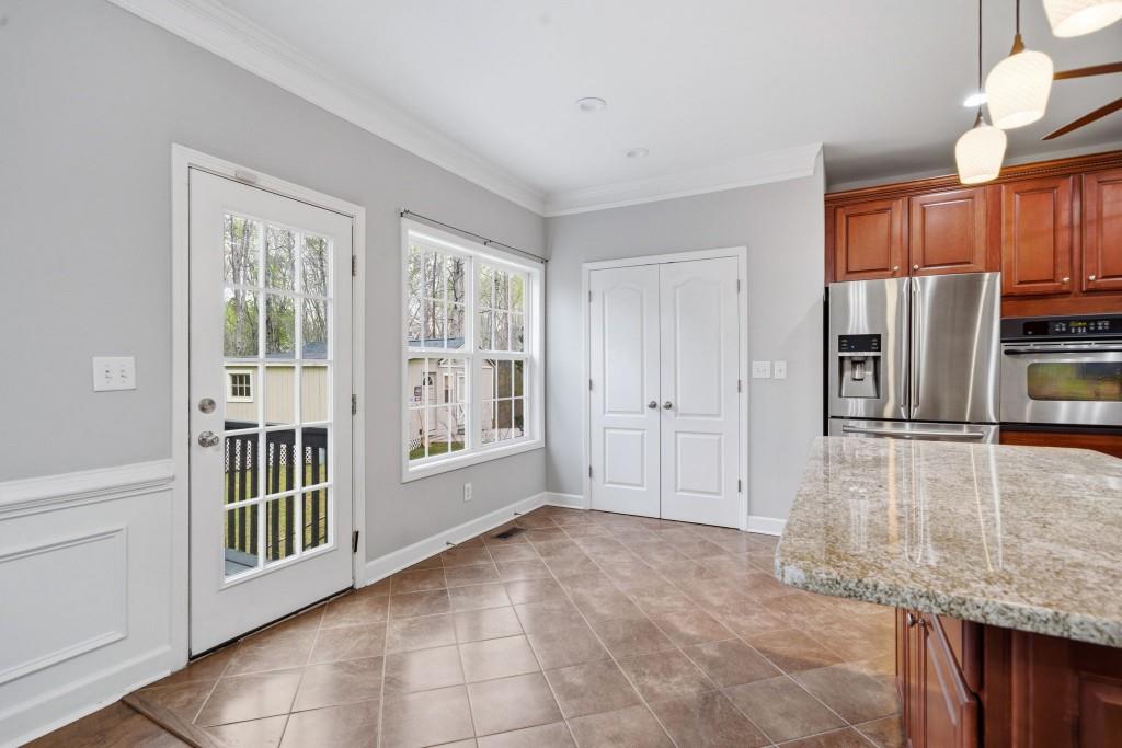 42 Nate Trail Dallas, GA 30157 - Photo 17 of 67 a view of a kitchen with a sink and dishwasher cabinets