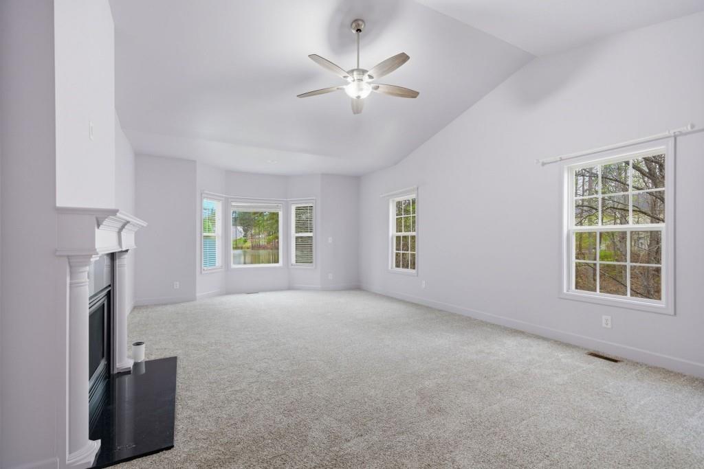 42 Nate Trail Dallas, GA 30157 - Photo 22 of 67 a view of a livingroom with a ceiling fan and window