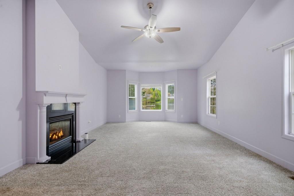 42 Nate Trail Dallas, GA 30157 - Photo 23 of 67 a view of a livingroom with a fireplace and a window