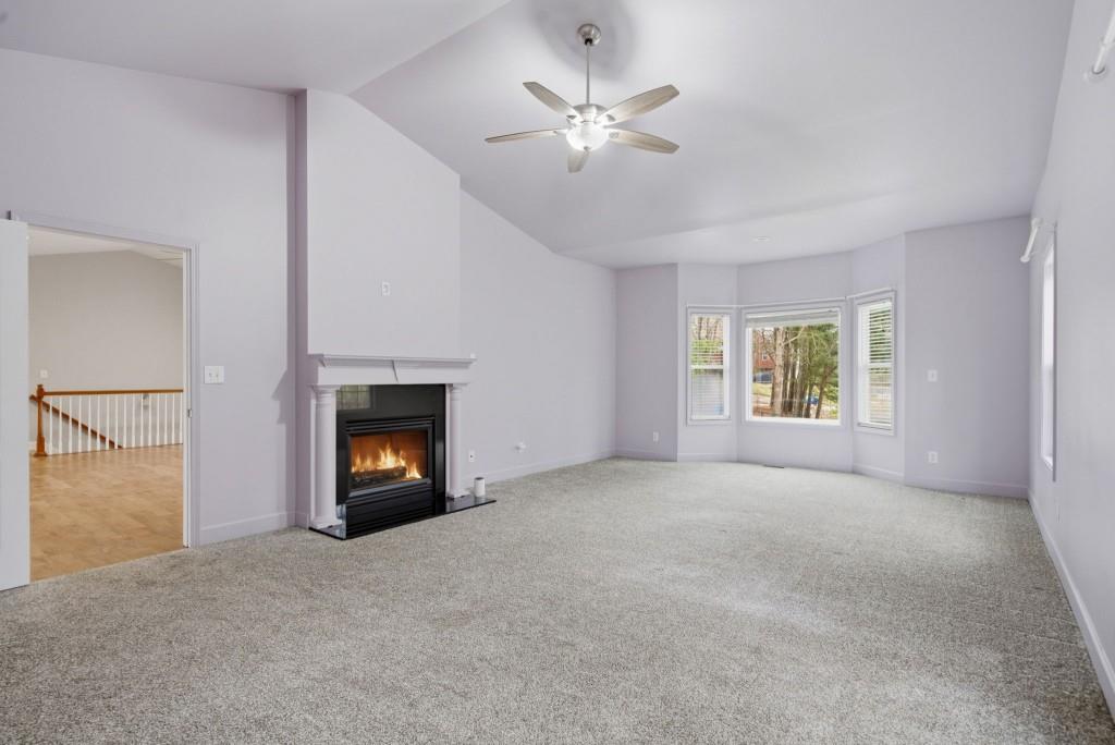 42 Nate Trail Dallas, GA 30157 - Photo 24 of 67 a view of a room window and a fireplace