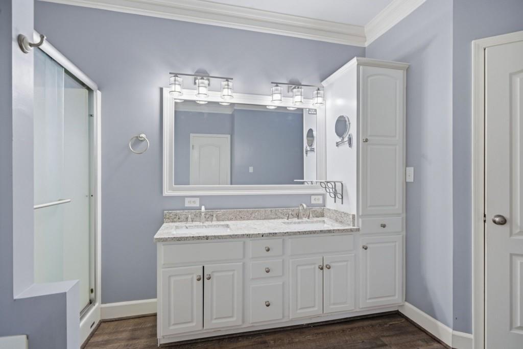 42 Nate Trail Dallas, GA 30157 - Photo 26 of 67 a bathroom with a double vanity sink and a mirror