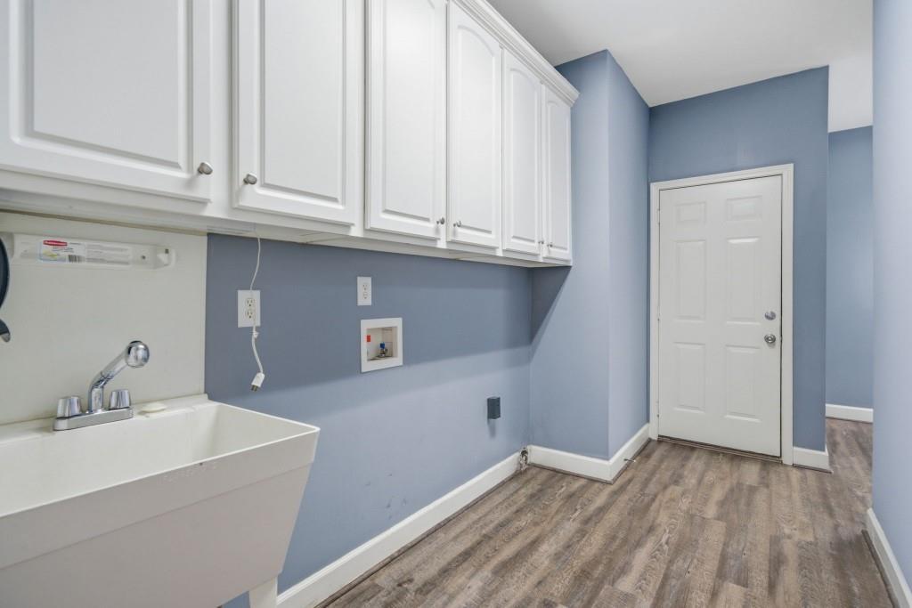 42 Nate Trail Dallas, GA 30157 - Photo 30 of 67 a bathroom with a sink and a mirror