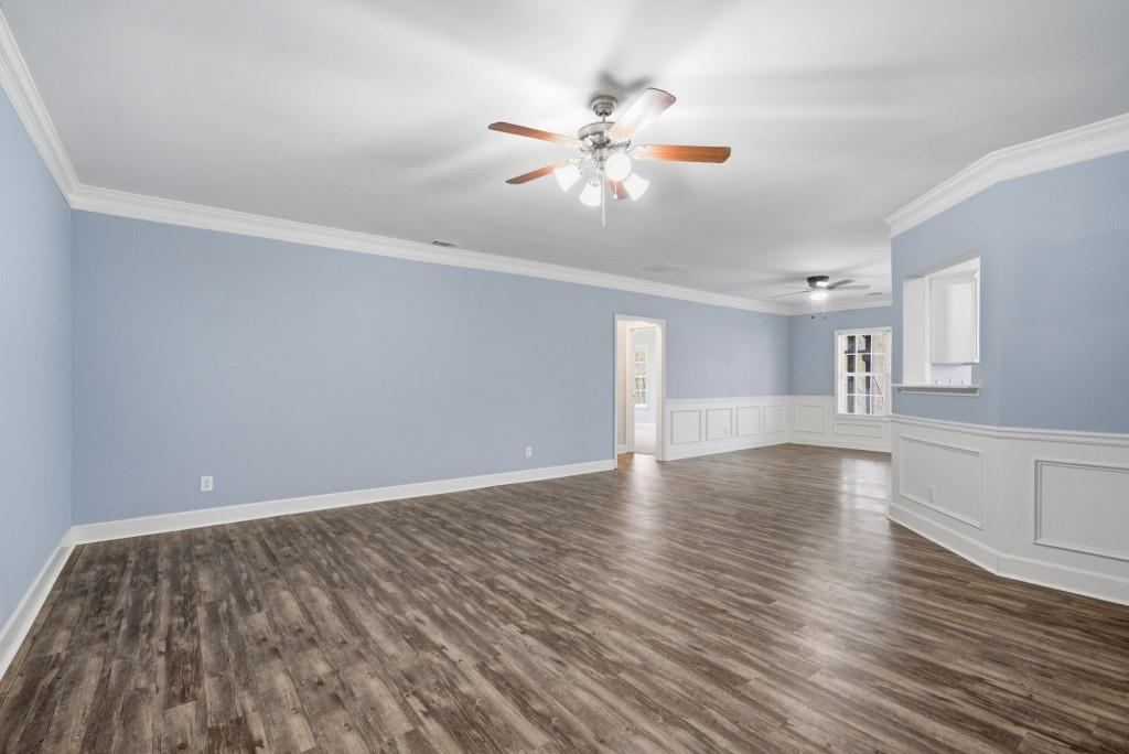 42 Nate Trail Dallas, GA 30157 - Photo 36 of 67 a view of an empty room with window and wooden floor