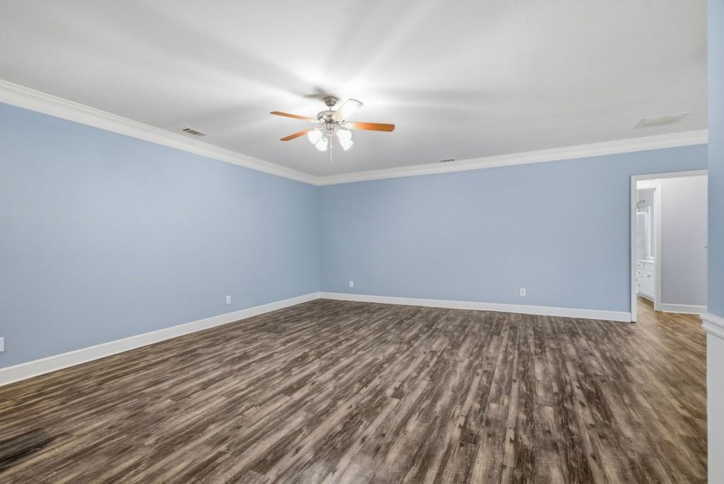 42 Nate Trail Dallas, GA 30157 - Photo 37 of 67 wooden floor in an empty room with a window