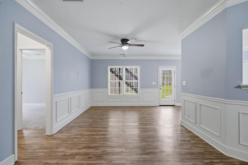 42 Nate Trail Dallas, GA 30157 - Photo 39 of 67 a view of an empty room with a window and wooden floor