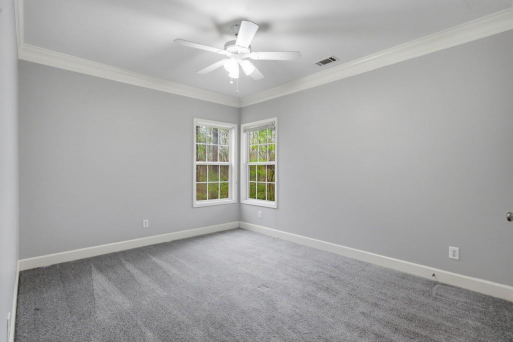 42 Nate Trail Dallas, GA 30157 - Photo 44 of 67 a view of an empty room with a window
