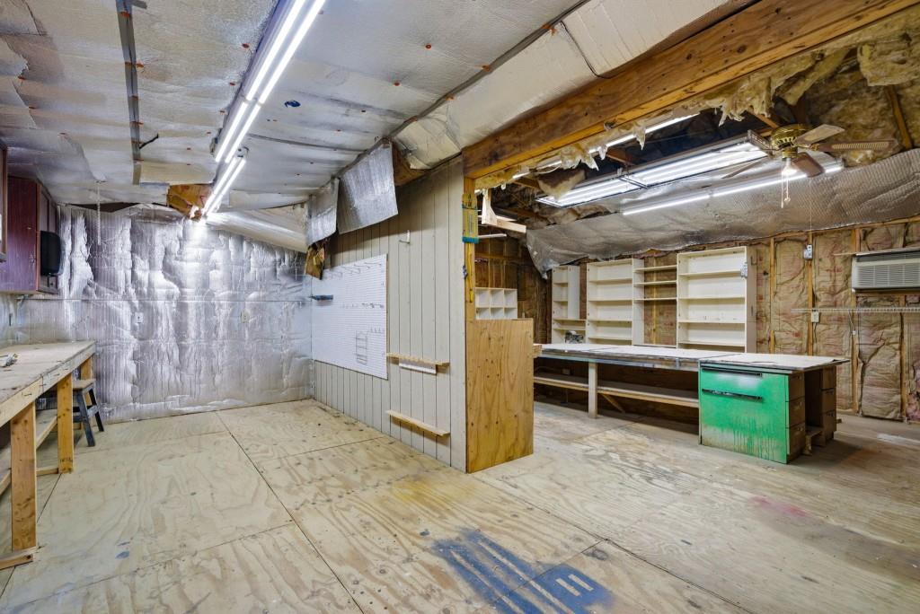 42 Nate Trail Dallas, GA 30157 - Photo 52 of 67 a view of an empty room with a fireplace