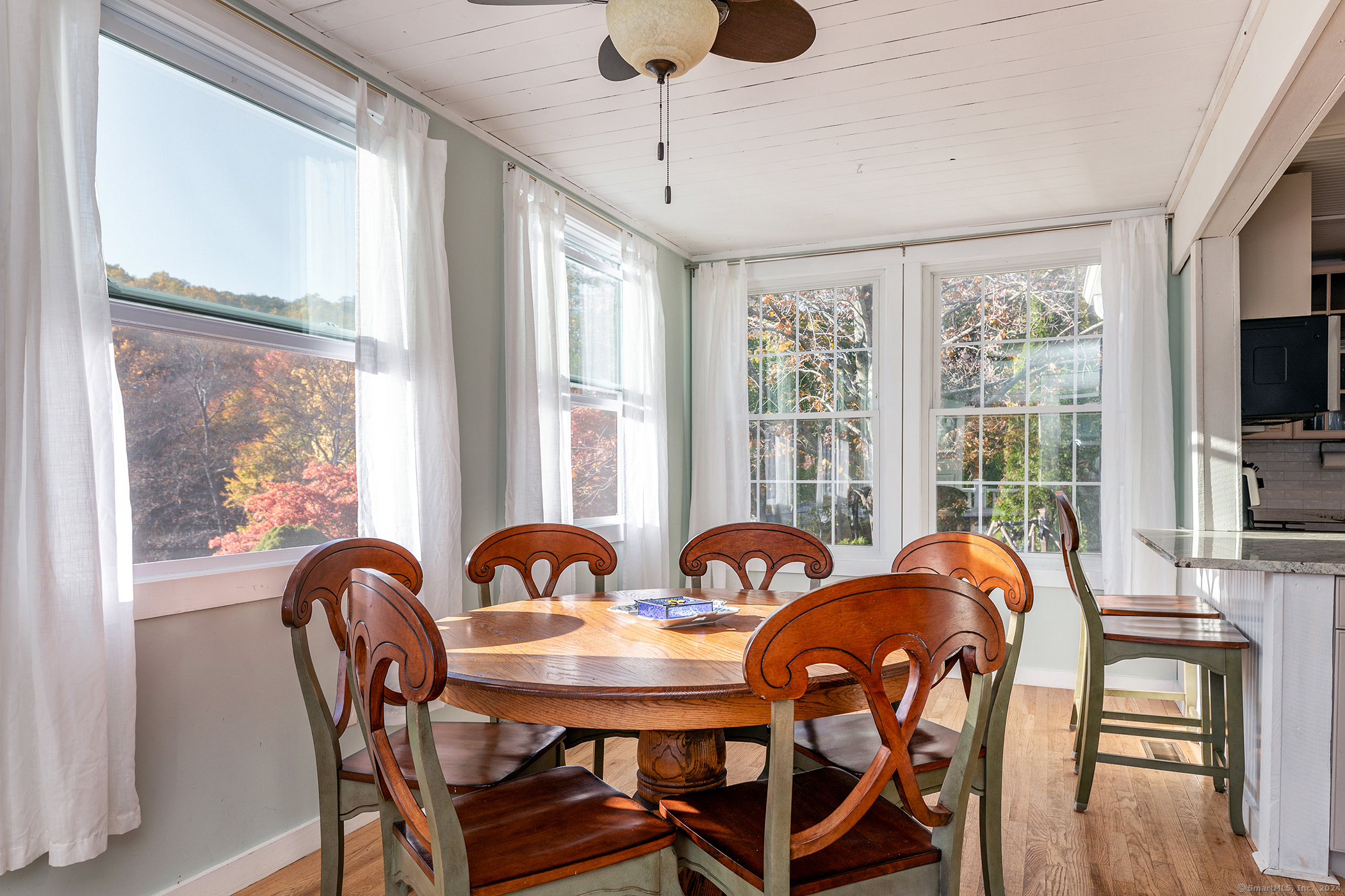 5 Windmill Road New Fairfield, CT 06812 - Photo 15 of 37 a view of a dining room with furniture window and outside view