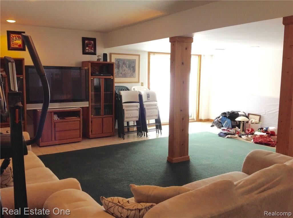 6070 Ormond Road White Lake, MI 48383 - Photo 26 of 36 FINISHED LOWER LEVEL WALK OUT