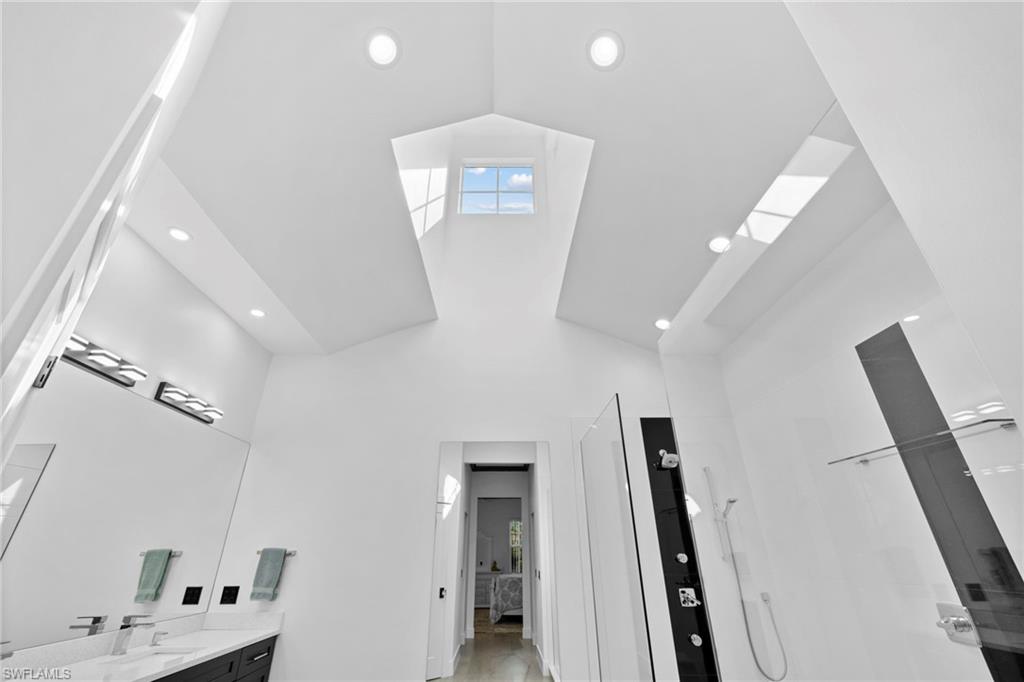 6903 Mauna Loa Lane Naples, FL 34113 - Photo 27 of 46 a view of a hallway with workspace