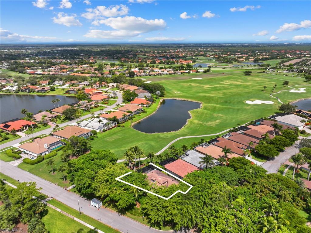 6903 Mauna Loa Lane Naples, FL 34113 - Photo 44 of 46 an aerial view of a a yard and outdoor space